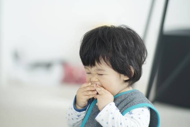 istock Baby boy eating at home 1198769148