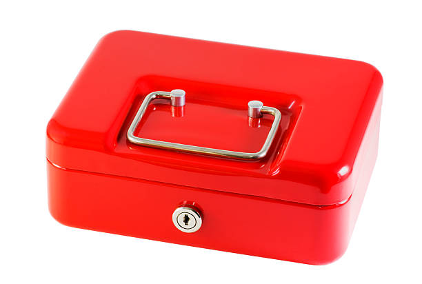red metal box for storage of money stock photo