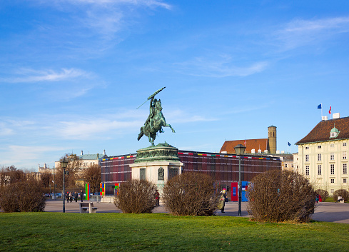 Vienna, Austria - December 20, 2019: Heldenplatz Square with equestrian statue of Archduke Charles made by A.D. Fernkorn in (1859) and people