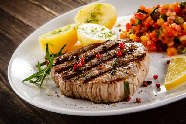 istock Grilled beef steak with boiled potato and vegetables 1198778464