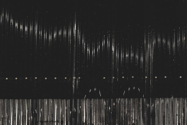 istock Street light reflecting off a warehouse's plastic corrugated wall 1198787295
