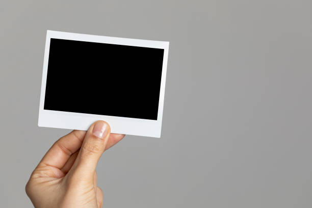 istock Hand Holding Instant Photo 1198788994