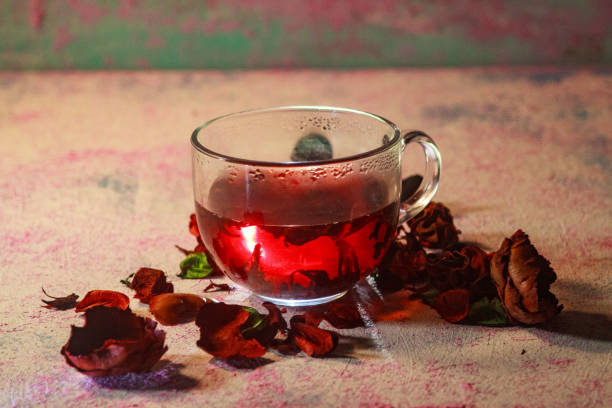 istock Red Hot Hibiscus tea in a glass mug 1198790083