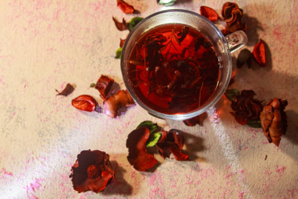 istock Red Hot Hibiscus tea in a glass mug 1198790102