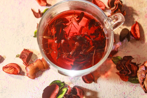 istock Red Hot Hibiscus tea in a glass mug 1198790160