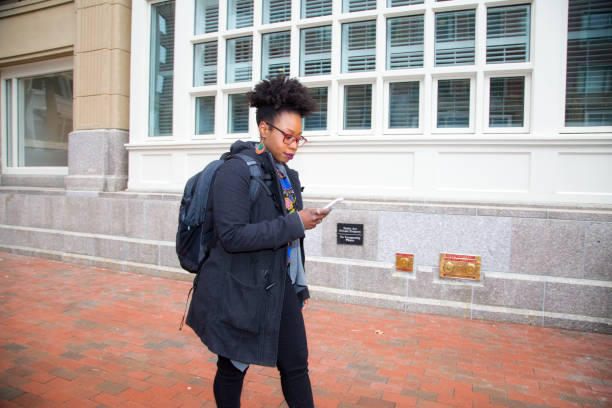 Young woman with phone in Boston