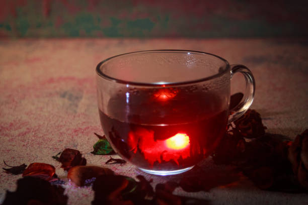 istock Red Hot Hibiscus tea in a glass mug 1198790181