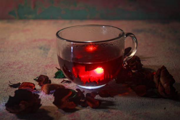 istock Red Hot Hibiscus tea in a glass mug 1198790193