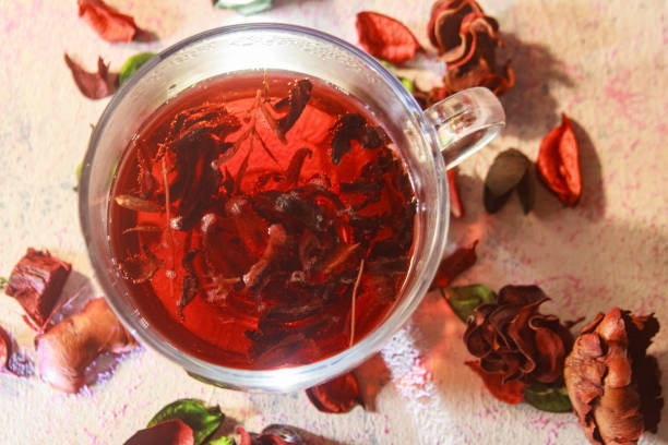 istock Red Hot Hibiscus tea in a glass mug 1198790252