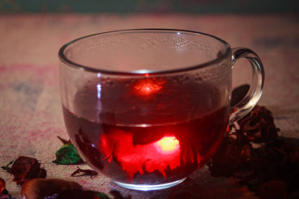 istock Red Hot Hibiscus tea in a glass mug 1198790273