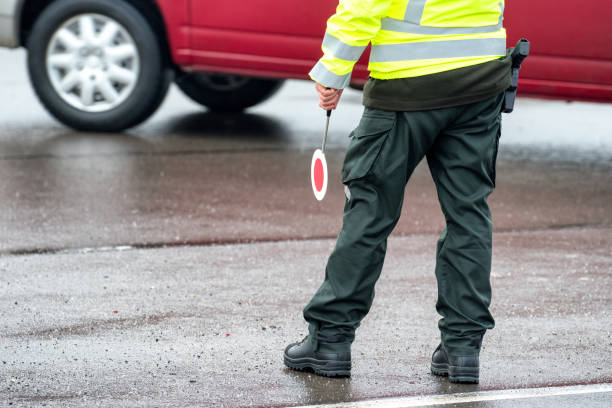 istock Traffic cop with stop sign 1198791489
