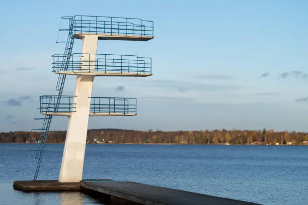 Photo of Image of diving tower on the blue lake