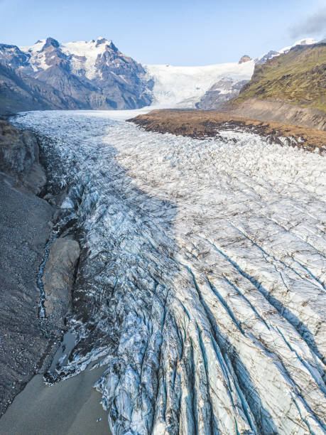 istock Rugged Glacier in Iceland Aerial View Showing Deep Crevices 1198792676