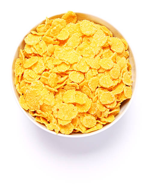 istock Bowl full of cornflakes over white background. Top view 119879717