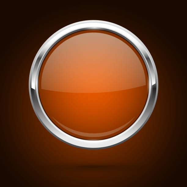 istock Orange glass button with metal frame. Round icon on dark background 1198797293