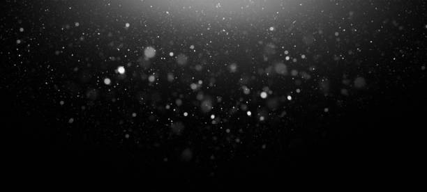 Defocused White Lights Over Dark Background