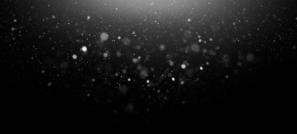 defocused огни абстрактный фон - snowing snow snowflake night стоковые фото и изображения