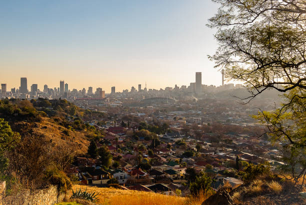 Sunset over a Johannesburg suburb and central business district stock photo