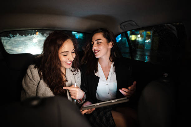 istock Hardworking female coworkers finding solution for business project 1198804129