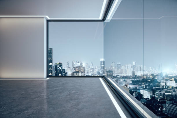 Minimalist office with city view Minimalist empty spacious office interior with illuminated panoramic city view. 3D Rendering office window night stock pictures, royalty-free photos & images