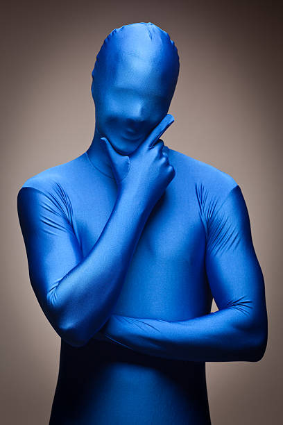 mann trägt mit blauem nylon bodysuite - gymnastikanzug stock-fotos und bilder