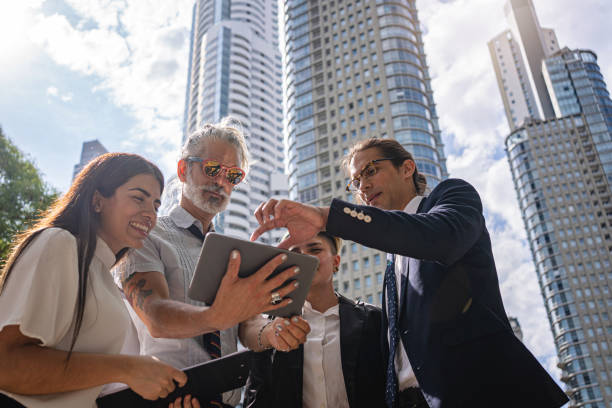 istock Business people using a tablet to brainstorm ideas 1198814695