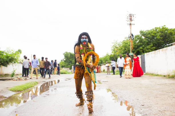 A Himdu Devotee A Devotee performs for Bonalu or Goddess Mahankali is a Hindu Festival, celebrated in Hyderabad, India on 7th Jul 2019 – 28th Jul 2019, These 21 days is called Ashada Masam, of July/August every year bonalu pictures stock pictures, royalty-free photos & images