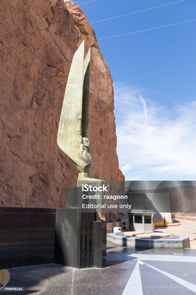 Winged Figures of the Republic, Boulder City, USA Boulder City, Nevada, USA- 01 June 2015: Winged Figures of the Republic at Hoover Dam. Concrete gravitational arc dam, built in the Black Canyon on the Colorado River. Hoover Dam Stock Photo
