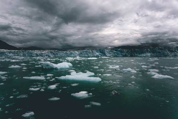Columbia glacier, Alaska, passing through ice filled waters and mountains, United States of America