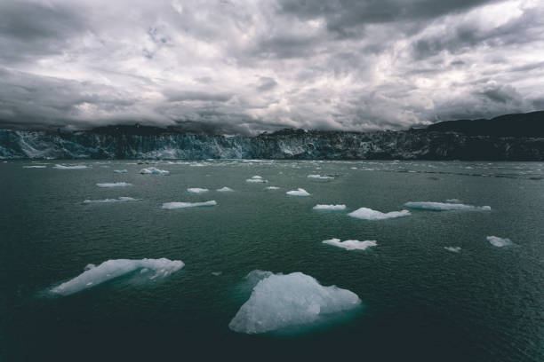 Columbia glacier, Alaska, passing through ice filled waters and mountains, United States of America