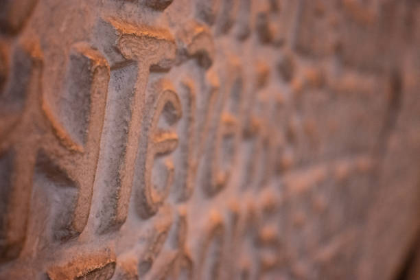 Arab ancient writing on a stone wall in Istanbul Turkey.