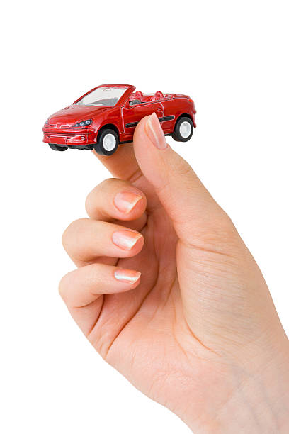 istock Hand and toy car 119882647