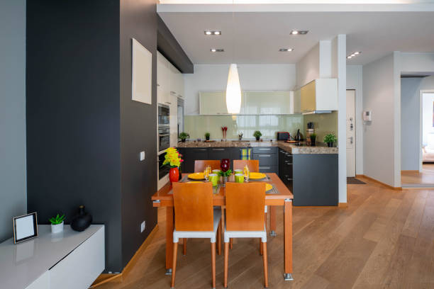 istock View of kitchen in studio apartment. Stylish kitchen set. Private house. 1198828954