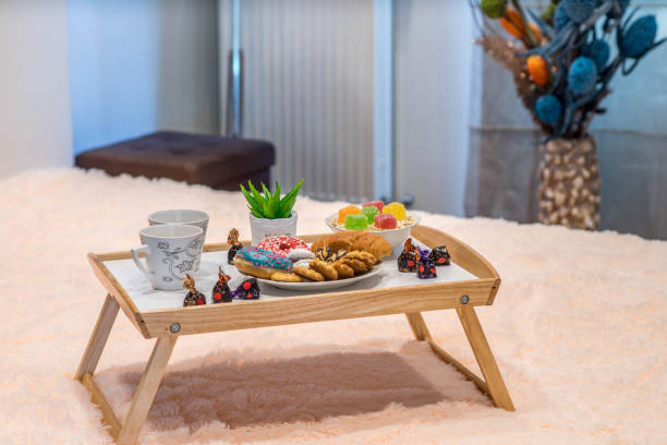 istock Romantic breakfast composition. Couple of cups. Cookies and sweets. 1198828982