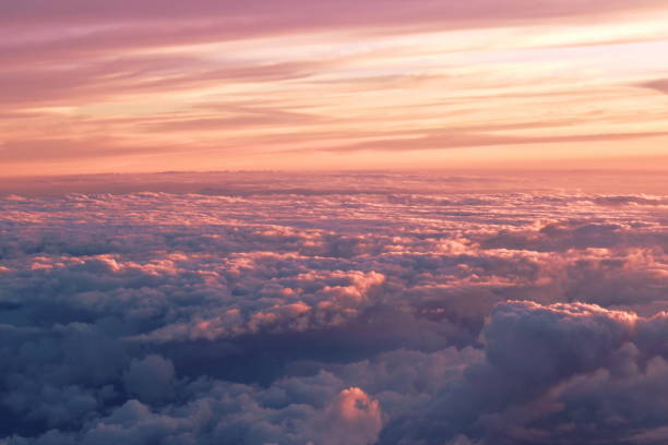 istock landscape of cloud floating through window plane in sunset 1198831247
