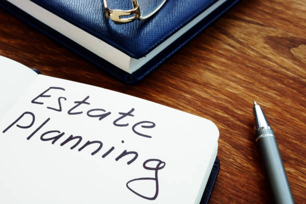 istock Estate planning handwriting sign on the sheet. 1198834050