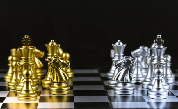 istock Chess game, set the board waiting to play in both gold and silver pieces 1198837274