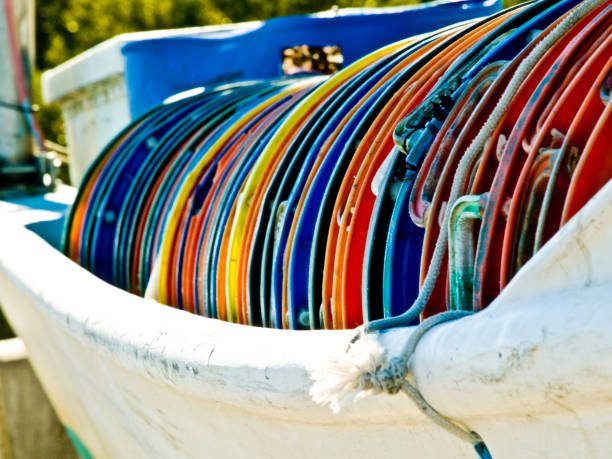 Cedar Key, FL USA 02/01/2009: Scene of fishing gear stacked in a row on a fishing boat in Cedar Key on Florida's Nature Coast.