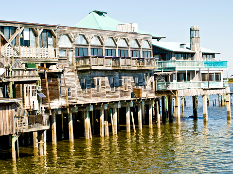 Cedar Key, FL USA 02/01/2009: Scene of businesses built of harbourside pier in Cedar Key on FLorida's Nature Coast.