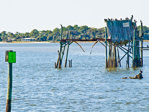 Cedar Key, FL USA 02/01/2009: Scene of small elevated fishing shack in Cedar Key on Florida's Nature Coast.