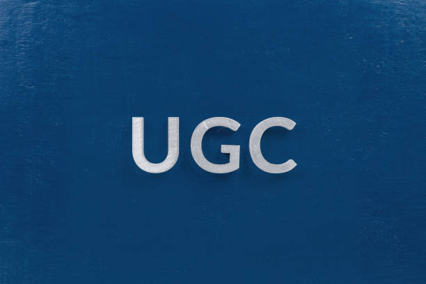 istock the word ugc - user generated content - laid by white silver metal letters on classic blue background in flat lay 1198846929