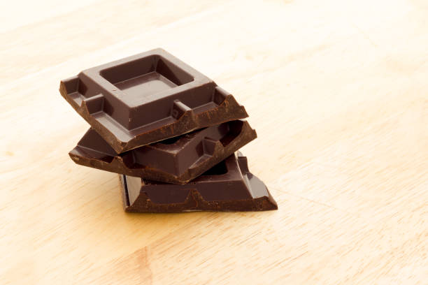 istock Cubes of dark chocolate 1198848355