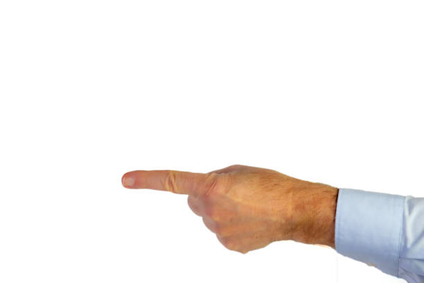 mão esquerda de um homem na camisa azul clara do negócio com o indicador streched para fora que aponta em algo, fundo branco, espaço da cópia - streched out - fotografias e filmes do acervo