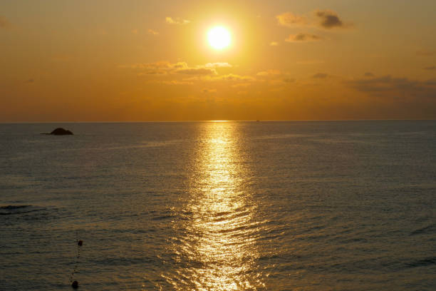 Sunset over sea on Ibiza island on a sunny summer day.