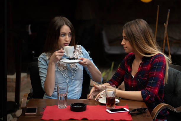 istock Women having fun during coffee time in a cafe. 1198858676