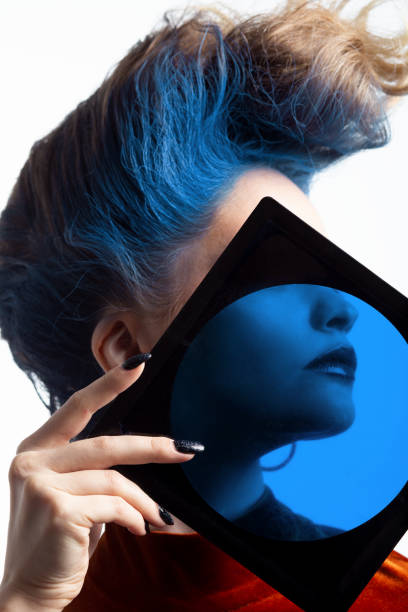 istock Woman holding blue lens 1198862199