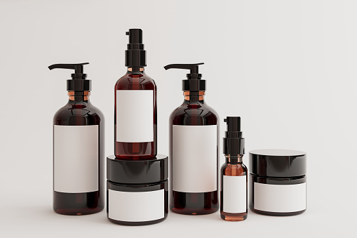 Maqueta de producto de belleza para el cuidado de la piel y el cabello, botella de loción, aceite, crema, aislado en blanco, renderizado en 3D, ilustración 3d photo