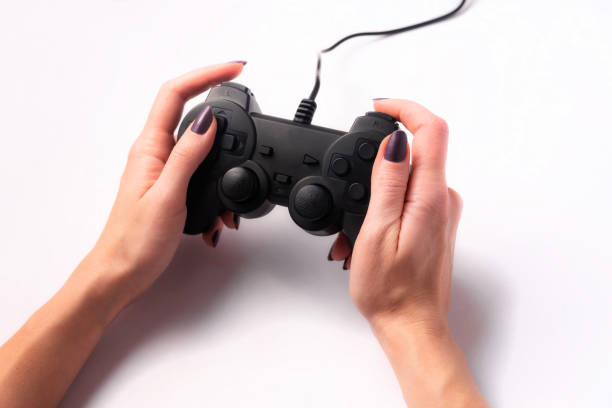 istock Joystick in female hands 1198864007
