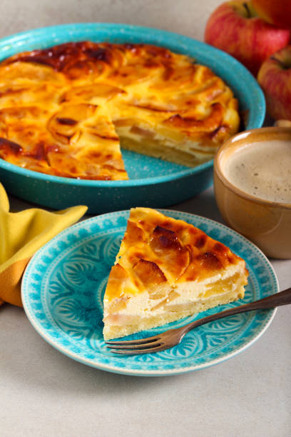 istock Apple cream cake, sliced and served 1198864214