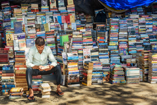 Books for sale at street side market stall near Flora Fountain in Mumbai. India stock photo